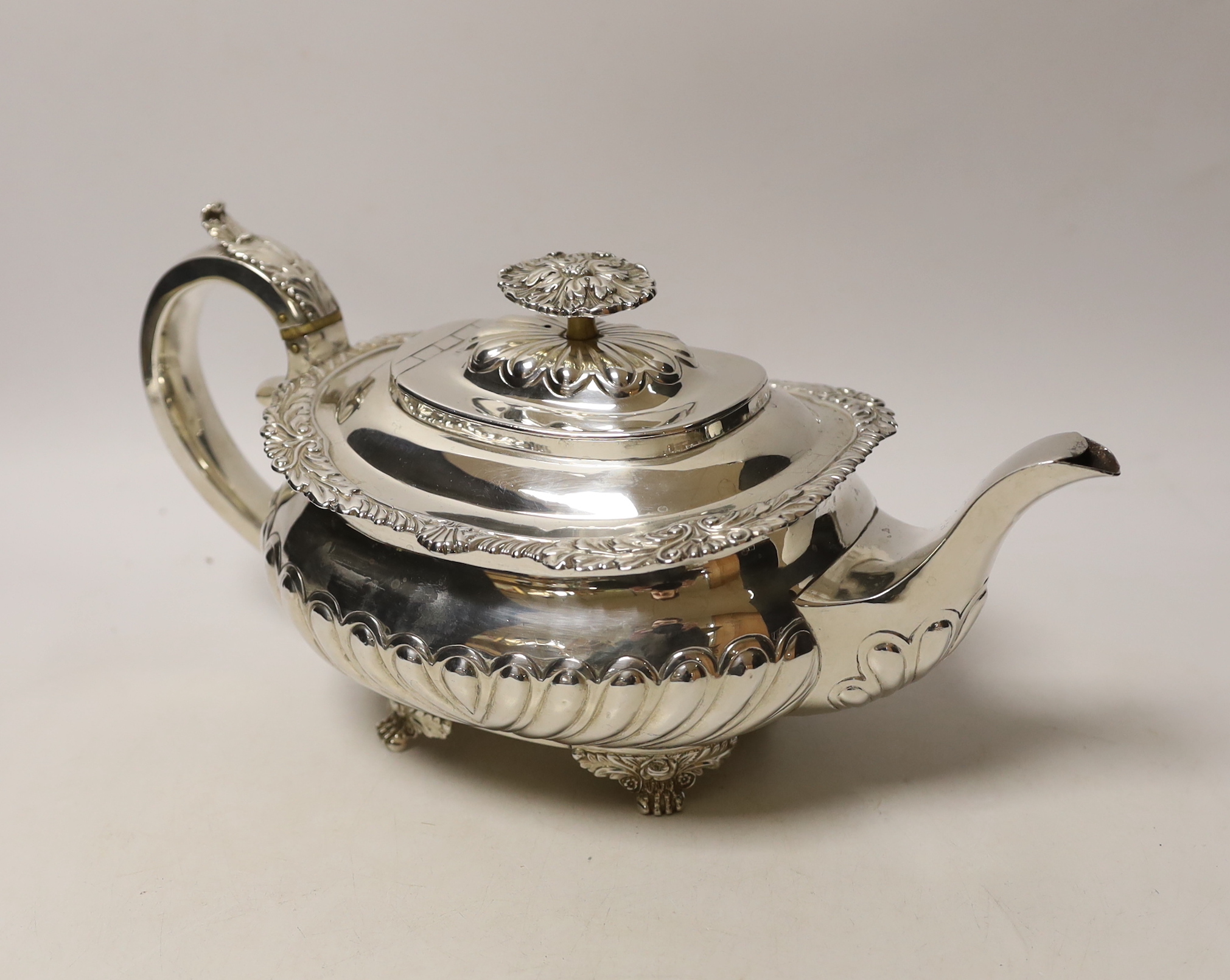A George IV demi-fluted silver oval tea pot, maker RP, London, 1823, gross weight 23.2oz, CITES Submission reference, 4XP4B3AZ